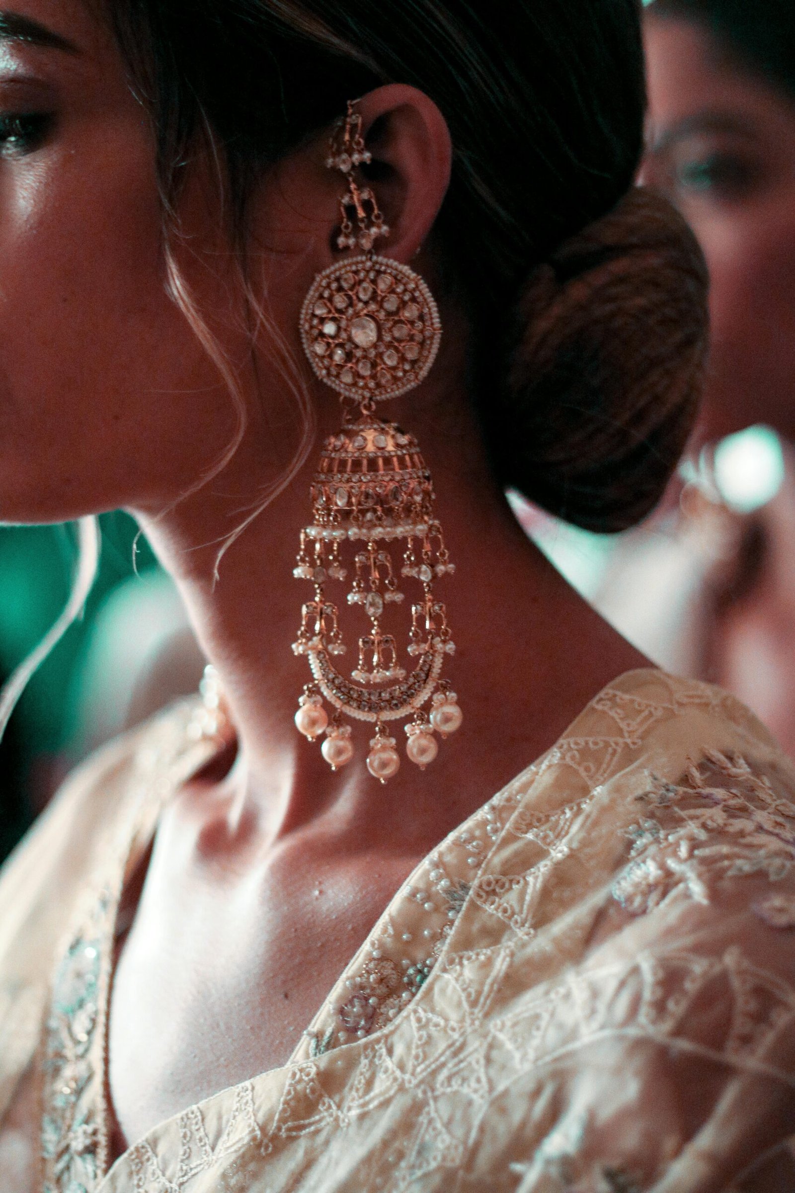 Close-up of a traditional Indian bridal earring showcasing intricate craftsmanship and design.